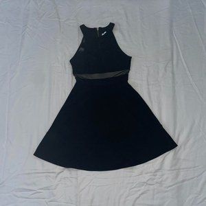 Black dress with mesh stomach cut out, kneeling size extra small